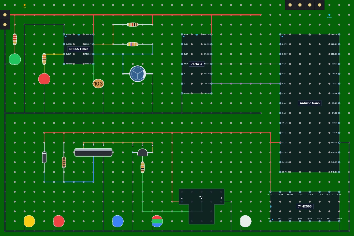 A perfboard layout in Perfboard Designer: an NE555 blinker with resistors, capacitors and LEDs, a 74HC14, an Arduino Nano, a MOSFET driver and colored jumper wires